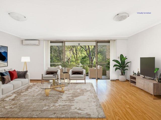 Spacious northwest facing two bedroom unit with tandem lockup garage