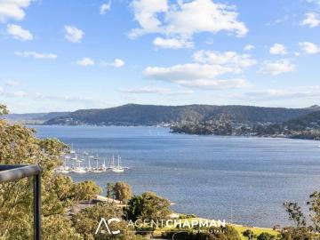 Spacious Penthouse Style Living With Stunning Water Views and Central Convenience