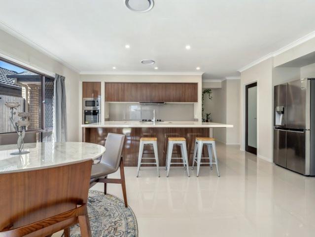 Spacious Plantation Built Family Home with Multiple Living Areas