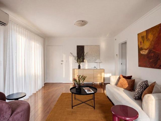 Spacious private sanctuary boasts wraparound backyard