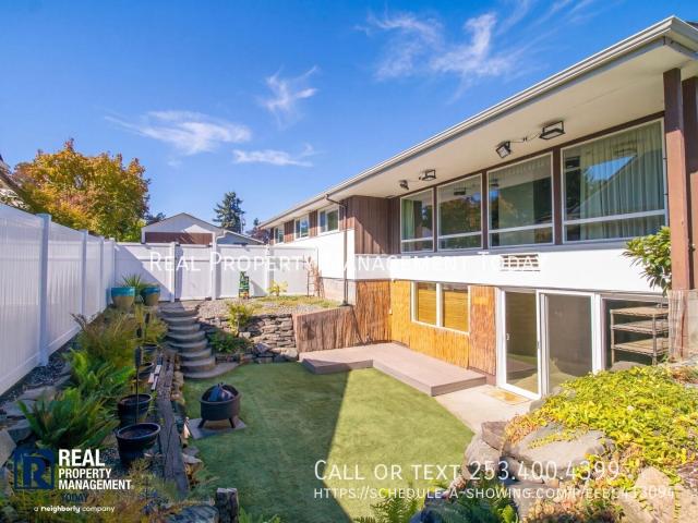 Spacious Puyallup Home with Suite Style Basement, Tiki Bar & Garden Retreat!