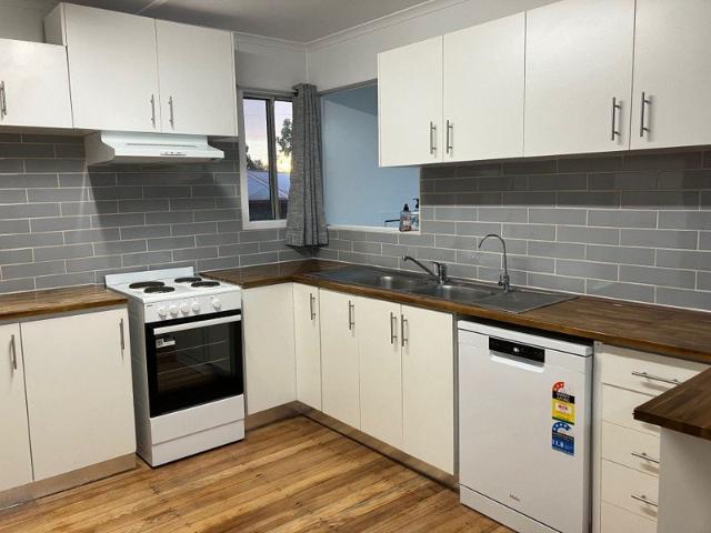 Spacious, Renovated 5 Bedroom Home Walk to Town