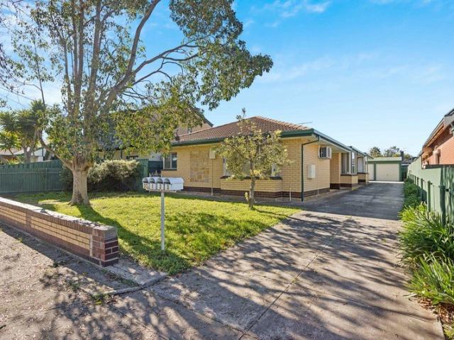 Spacious Rear Yard Unit with 2 Vehicle Parking