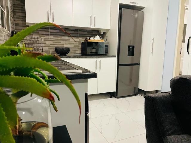 Spacious, semi furnished one bedroom Apartment To Rent in Sandown, Sandton