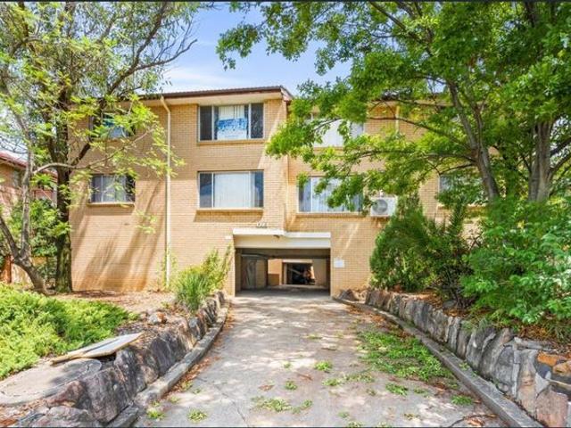 Spacious & Secure 3 Bedroom Unit in Prime Merrylands Location!