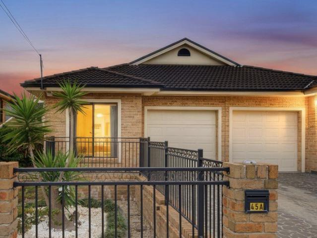 Spacious Single Level Duplex Offering Exceptional Family Living