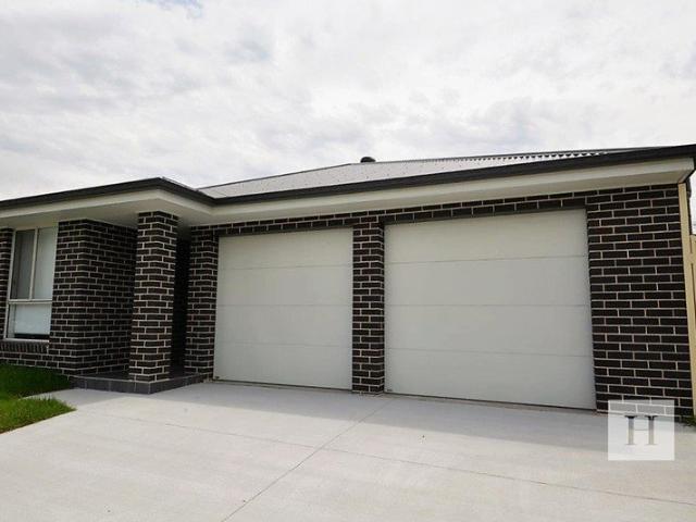 Spacious Single Level Duplex in a Convenient Location