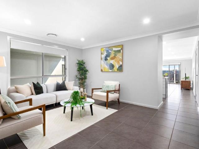 Spacious Single Level Family Home with Solar, Multiple Living Areas & Large Backyard!