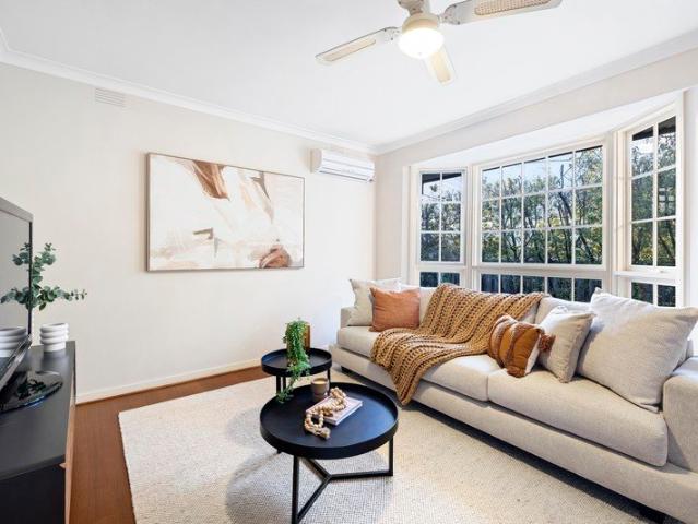 Spacious Single Level Living in a Tranquil Garden Setting