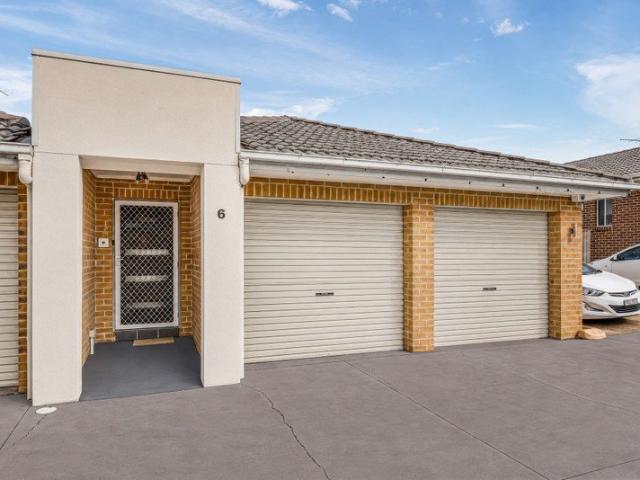 Spacious Single Level Living with a Private Backyard Oasis