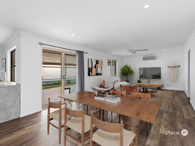 SPACIOUS SINGLE LEVEL LIVING WITH OUTSTANDING INDOOR OUTDOOR APPEAL