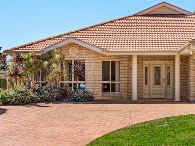 Spacious Single Level Living with Sun Filled Interiors & Exceptional Versatility