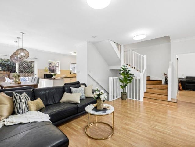 Spacious solid brick townhouse in peaceful boutique setting