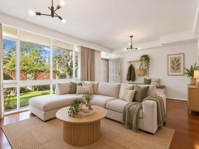 Spacious Split Level Townhouse with Park Views in a Boutique Setting