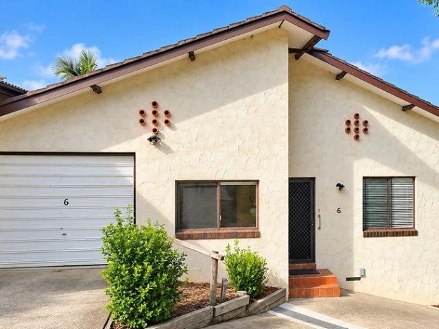 Spacious split level villa with leafy views