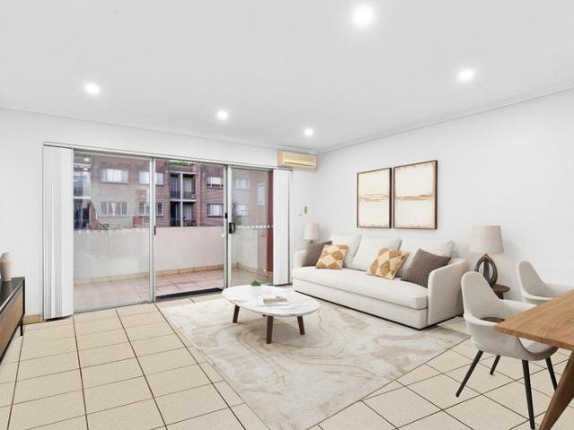 Spacious Split Level Apartment with Modern Comforts and Private Balconies