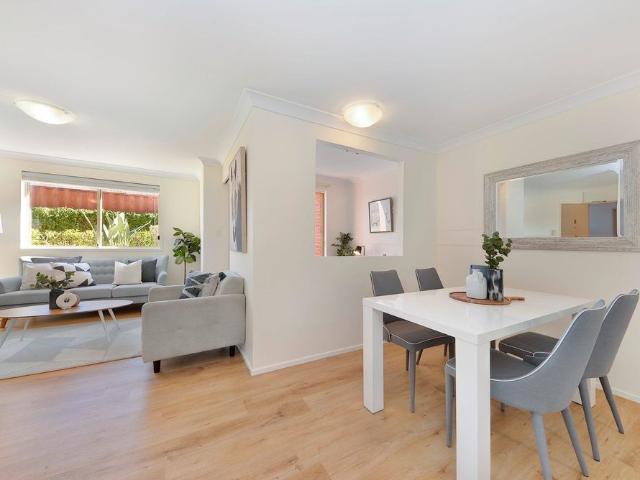 Spacious & Stylish Garden Apartment Moments from the Sand