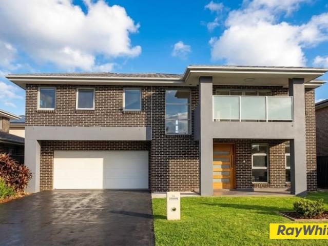 Spacious & Stylish, Sun Drenched Family Home Within 12 Minute Walking Distance to Schofields Train Station and Village!