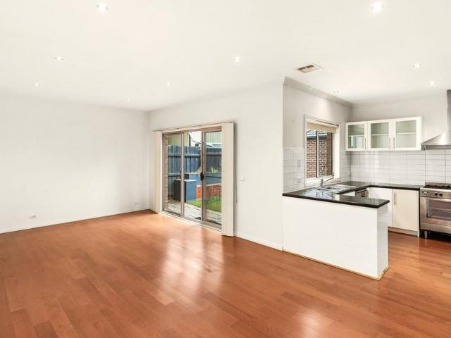 Spacious & Stylish Three Bedroom Home with Backyard