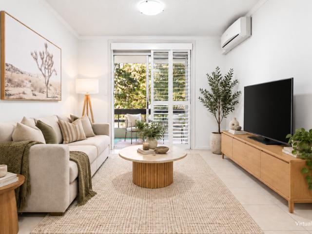 Spacious & Sun Filled Apartment in a Highly Convenient Location