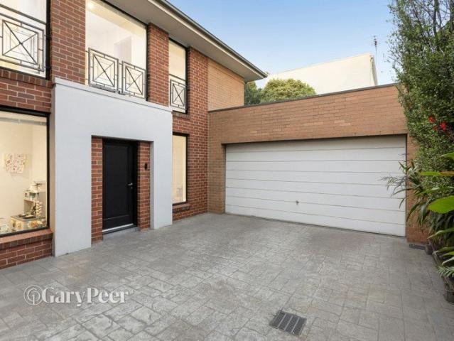 Spacious, sun filled living in a peaceful rear setting