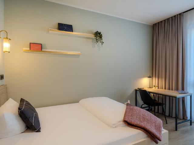 Spaciours studio apartment with a private balcony in a coliving community in Berlin, Pankow