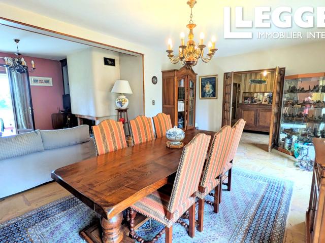 Spacieuse maison familiale de 4 chambres avec sous sol complet, véranda et jardin à Lubersac