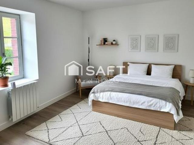 SPACIEUX. AVEC 3 CHAMBRES GARAGE COUR