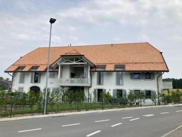 Spacieux et lumineux appartement de 4.5 pièces au 1er étage, avec balcon loggia couvert, situé dans une magnifique ferme vaudoise rénovée