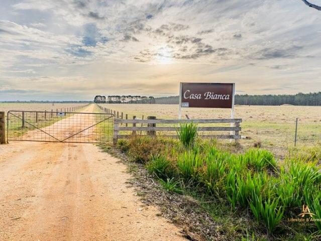 Spanish MissionStyle Farm Estate on 122 Acres in Giffard West