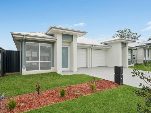 Sparkling, brand new, four bedroom duplex home