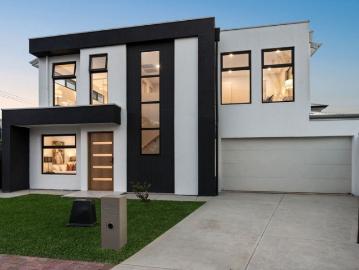 Sparkling New Coastal Luxe on a Coveted Corner Parcel