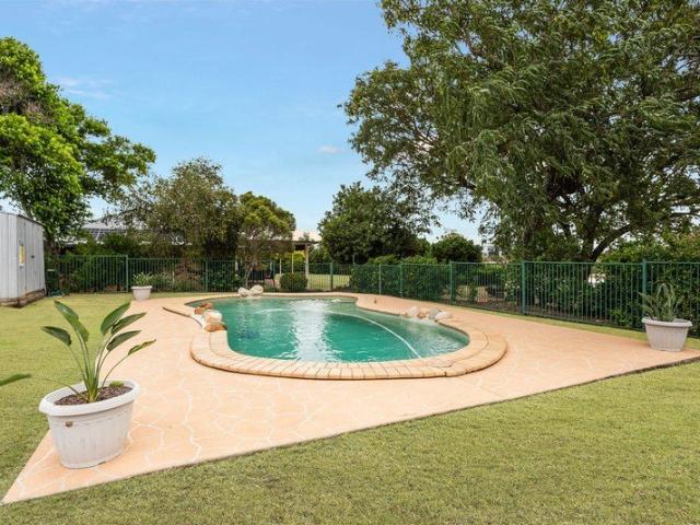 Sparkling pool, shed space and a well maintained lowset brick larged sized home!
