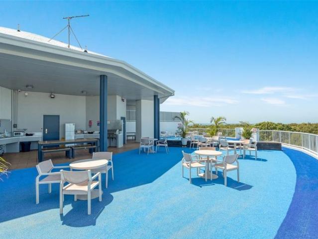 Spectacular 4 Bedroom Penthouse with Private Rooftop & Moreton Bay Views