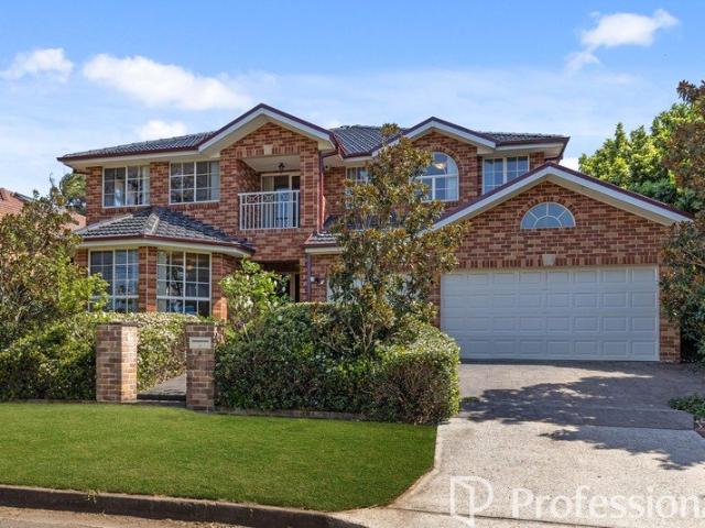 Spectacular 5 Bedroom Two Storey Brick Home in The Ultimate Blue Ribbon Location