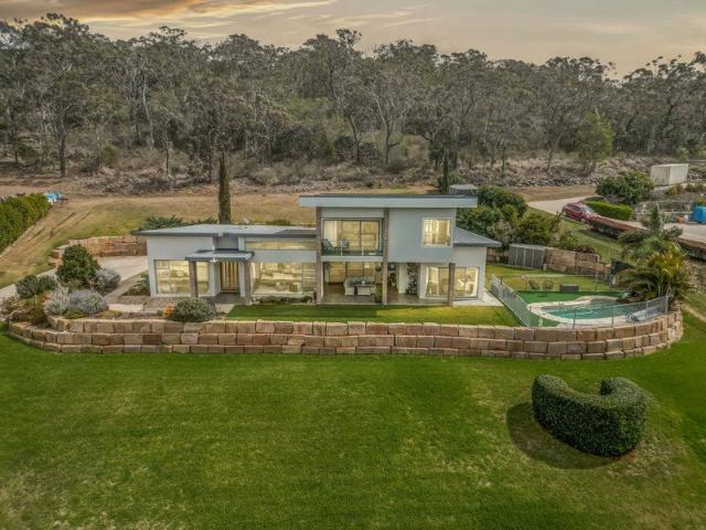 SPECTACULAR VIEWS, LUXURY LIVING & RESORT STYLE ENTERTAINING THIS ONE IS SOMETHING SPECIAL