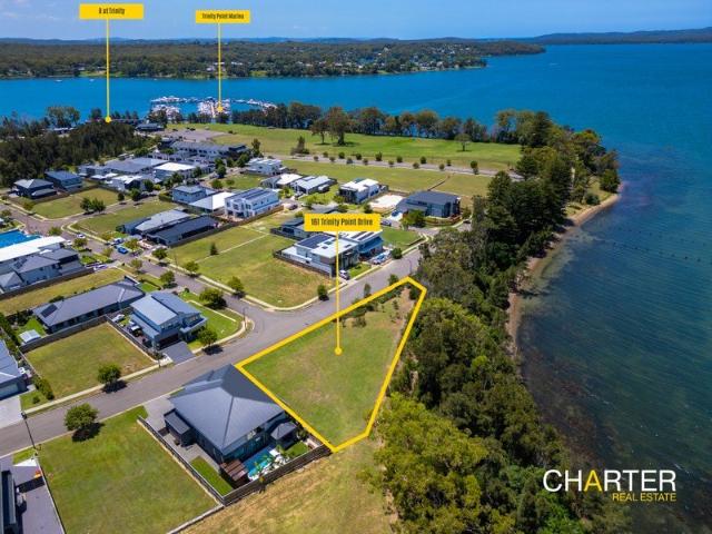 Spectacular waterfront opportunity in the highly sought after Trinity Point!