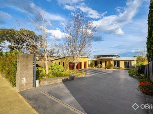 Spectacular Backwater Views with Unmatched Lifestyle Convenience
