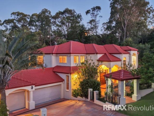 Spectacular Hillside Retreat with Bushland SerenityIn Prestigious sought after location with Inground pool and total Privacy !