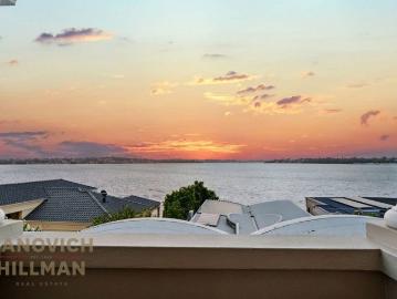 SPECTACULAR HOME WITH PANORAMIC RIVER VIEWS