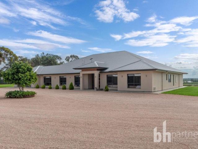 Spectacular Newly Built Family Home on Acreage with Stunning Backwater Views