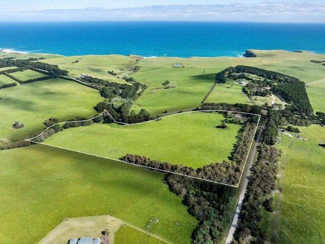 Spectacular ocean views, productive acreage and total privacy