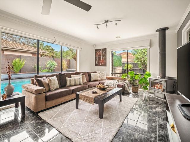 Spectacular Poolside Living in a Coveted Pocket