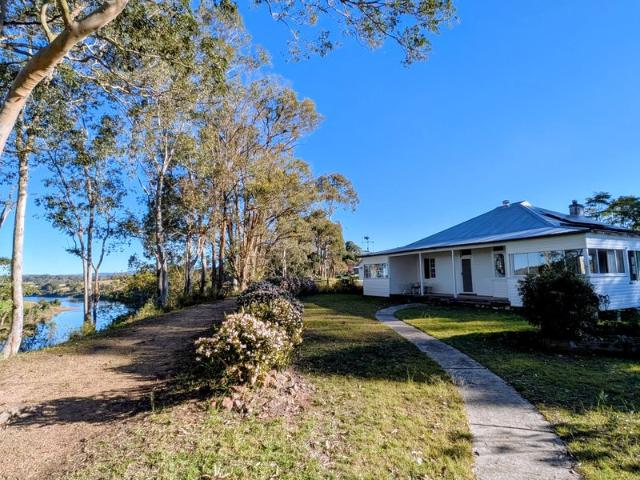 Spectacular secret perch high over Manning River. Unique, cosy, spacious, gracious old home on half an acre, seeking new owner. EOIs invited now!