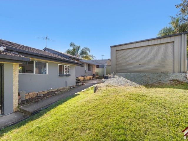 SPILT LEVEL HOME WITH PLENTY OF ROOM AND A SHED TOO