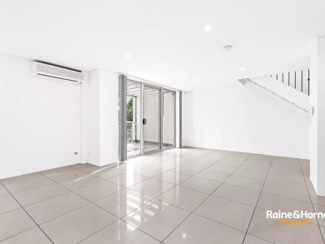 SPLIT LEVEL TWO BEDROOM APARTMENT WITH STUNNING DISTRICT VIEWS