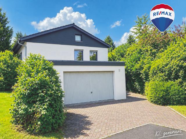 SPLIT LEVEL EINFAMILIENHAUS eingebettet im Grünen