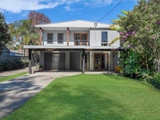 Split Level, Lakeside Living with Endless Potential!