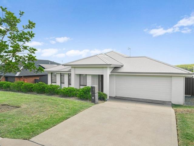 Split Plan Family Home with Double Island Kitchen and Fenced Yard