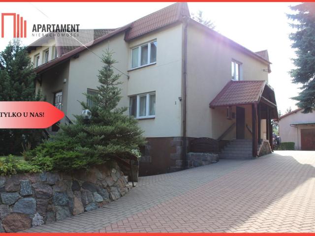 Sprzedam dom z halami magazynowymi i garażami 240 m²